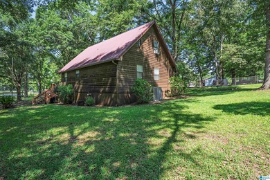 Escape to lake living with this charming waterfront home on - photo 4