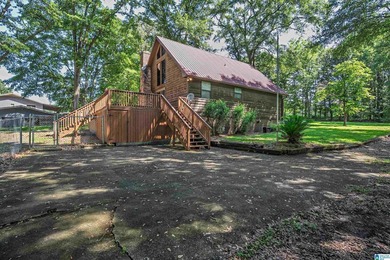 Escape to lake living with this charming waterfront home on - photo 5