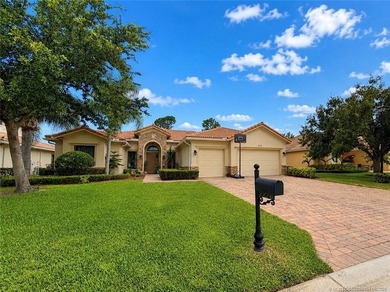 Nestled in The Falls of Jensen Beach, this spacious Kolter-built - photo 2