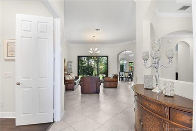 Nestled in The Falls of Jensen Beach, this spacious Kolter-built - photo 4