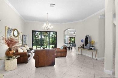 Nestled in The Falls of Jensen Beach, this spacious Kolter-built - photo 5