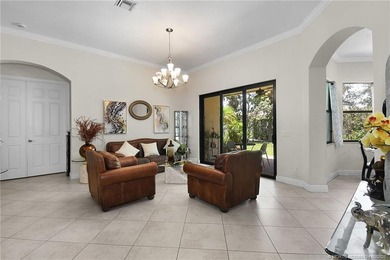 Nestled in The Falls of Jensen Beach, this spacious Kolter-built - photo 6