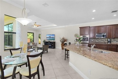 Nestled in The Falls of Jensen Beach, this spacious Kolter-built - photo 10