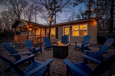 Discover your dream waterfront retreat on Lake Hamilton! This - photo 2