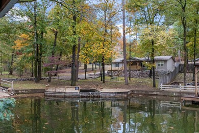 Discover your dream waterfront retreat on Lake Hamilton! This - photo 3