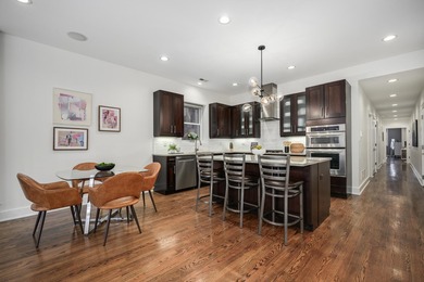 Located within an intimate seven-residence elevator building on