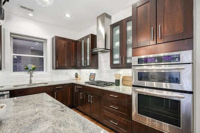 Located within an intimate seven-residence elevator building on