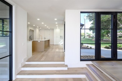 Experience elevated waterfront living at 313 Scenic Drive, where - photo 11