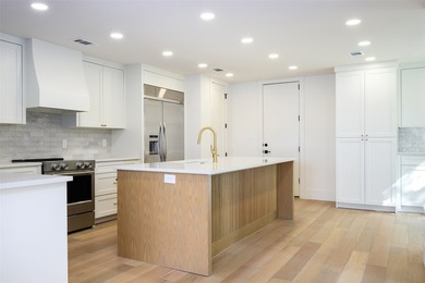 Experience elevated waterfront living at 313 Scenic Drive, where - photo 13
