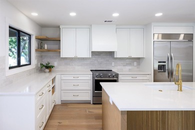 Experience elevated waterfront living at 313 Scenic Drive, where - photo 14