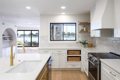 Experience elevated waterfront living at 313 Scenic Drive, where - photo 15