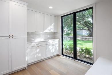 Experience elevated waterfront living at 313 Scenic Drive, where - photo 17