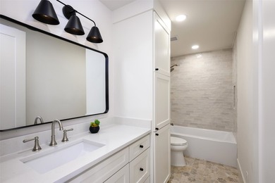 Experience elevated waterfront living at 313 Scenic Drive, where - photo 20