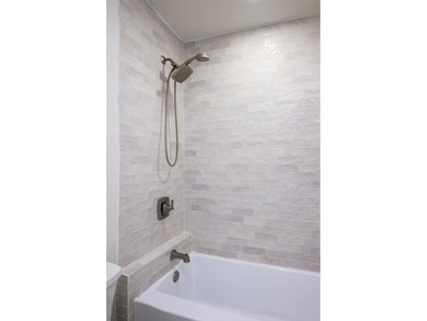 Experience elevated waterfront living at 313 Scenic Drive, where - photo 21