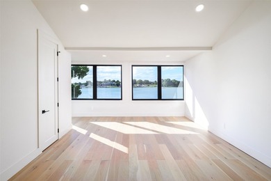 Experience elevated waterfront living at 313 Scenic Drive, where - photo 24