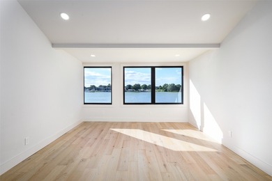 Experience elevated waterfront living at 313 Scenic Drive, where - photo 30