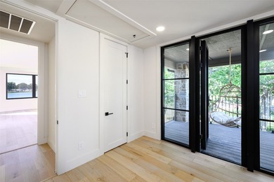 Experience elevated waterfront living at 313 Scenic Drive, where - photo 31