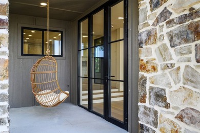 Experience elevated waterfront living at 313 Scenic Drive, where - photo 32