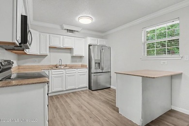 Welcome to this charming 3-bedroom, 2-bath brick home located in - photo 4