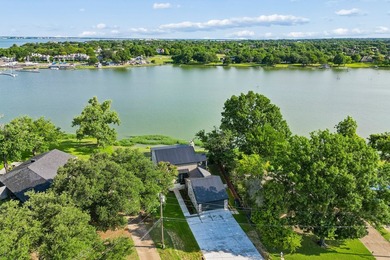Experience elevated waterfront living at 313 Scenic Drive, where - photo 40