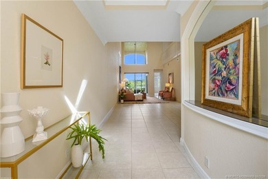 Nestled within the private gates of Palm Cove Golf & Yacht Club - photo 2
