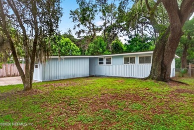 Fantastic centrally located open-concept home nestled beneath - photo 3