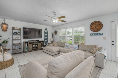 SHORT SALE BACK ON THE MARKET! Nestled in a quiet and desirable - photo 3