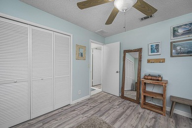 SHORT SALE BACK ON THE MARKET! Nestled in a quiet and desirable - photo 6
