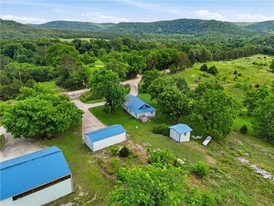 Positioned on 5.14 acres in a scenic Ozark Mountain setting near - photo 20