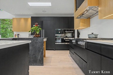 Set privately within WestShore, this striking modern compound - photo 19