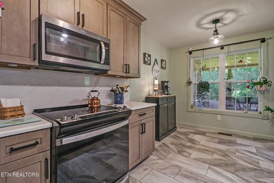 Lakefront brick home offering one-level living with numerous - photo 20