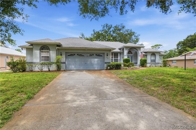 Situated on an elevated 0.34-acre lot overlooking the 13th hole - photo 1