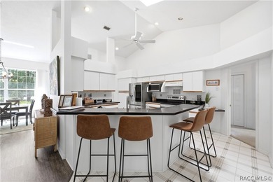 Situated on an elevated 0.34-acre lot overlooking the 13th hole - photo 3