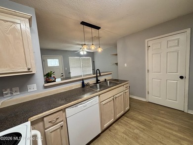 This charming 3 Bedroom/2 Bathroom Cottage-style home is nestled - photo 6