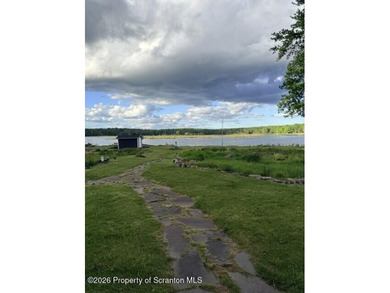 Lakefront ranch home that brings you back to equilibrium. This - photo 3
