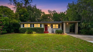 Welcome to this beautifully renovated 4-bedroom, 3-bathroom - photo 1