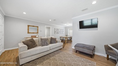 Welcome to this beautifully renovated 4-bedroom, 3-bathroom - photo 4