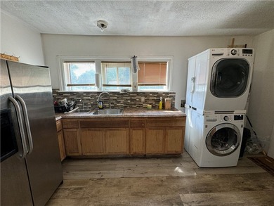 Welcome to 604 Upper Falls Blvd! This home offers two completely - photo 5