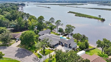 Spread across two waterfront lots along the Tchoutacabouffa - photo 2