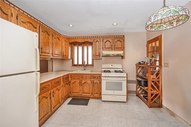 Welcome to this charming detached corner ranch nestled in the - photo 11