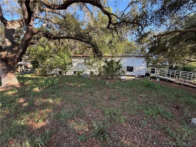 Investor special with plenty of upside potential! Situated on a - photo 1