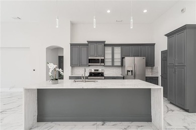 Welcome to this Ballantrae POOL home with golf and lake views - photo 11