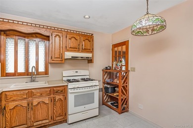 Welcome to this charming detached corner ranch nestled in the - photo 13