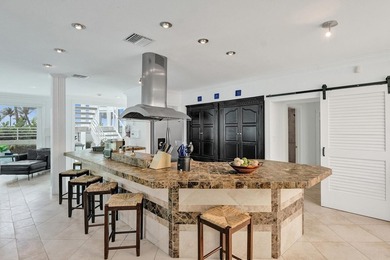Just one house from the ocean, this fully gated luxury residence - photo 17