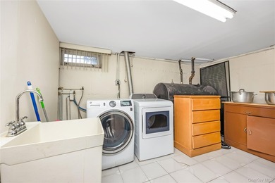 Welcome to this charming detached corner ranch nestled in the - photo 19