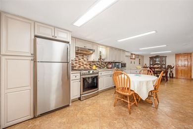 Welcome to this charming detached corner ranch nestled in the - photo 20