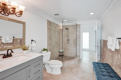 Just one house from the ocean, this fully gated luxury residence - photo 22