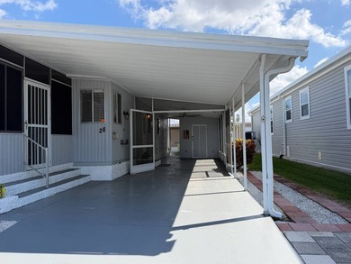 Welcome to the vibrant, gated Jamaica Bay community of Fort - photo 3