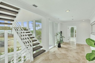 Just one house from the ocean, this fully gated luxury residence - photo 25