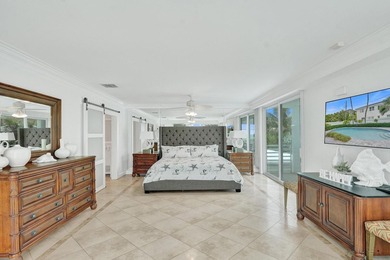 Just one house from the ocean, this fully gated luxury residence - photo 27